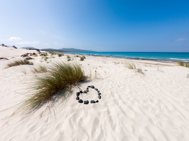 Sardinia beach of Porto Pino with love symbol