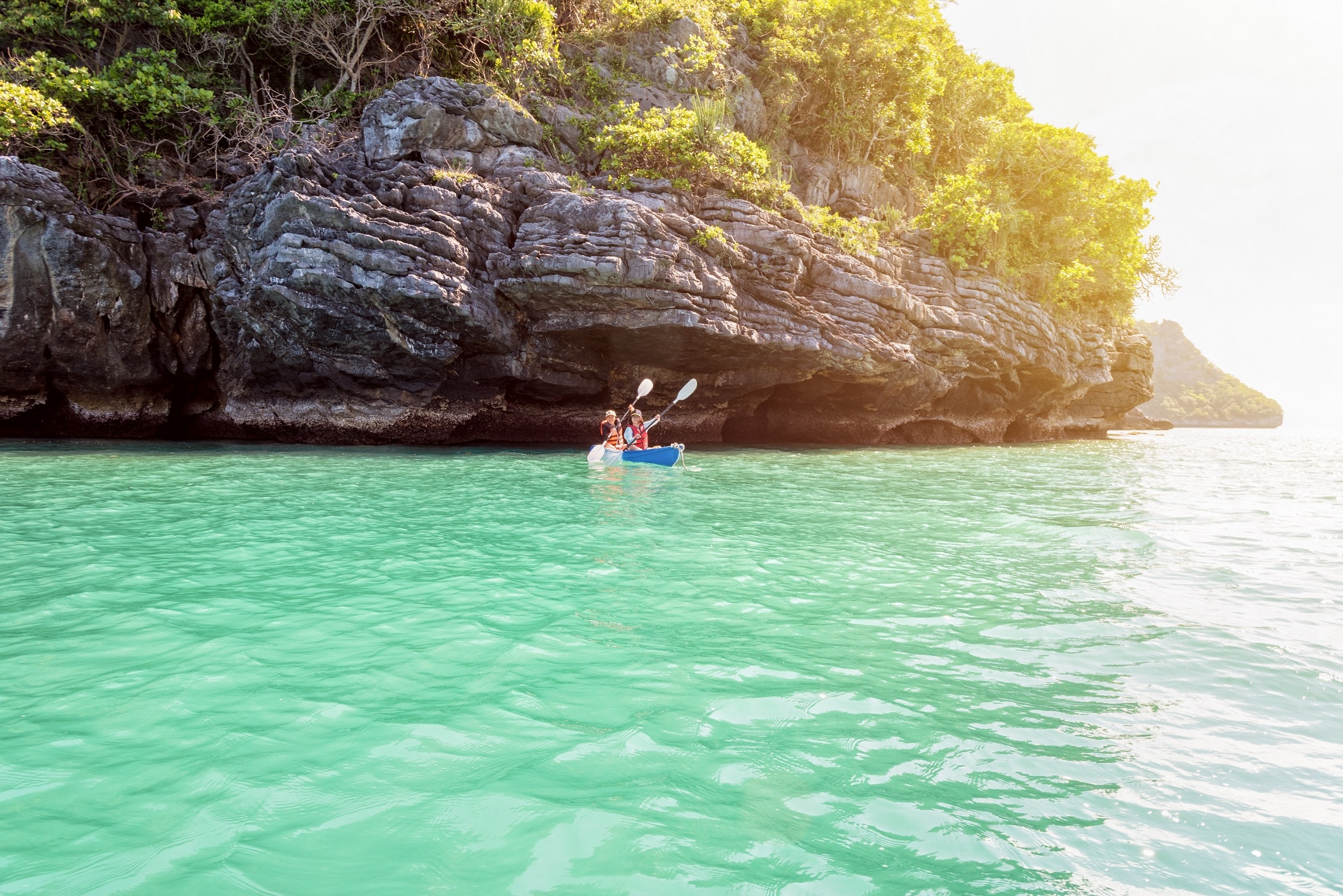 Mother and daughter travel by kayak