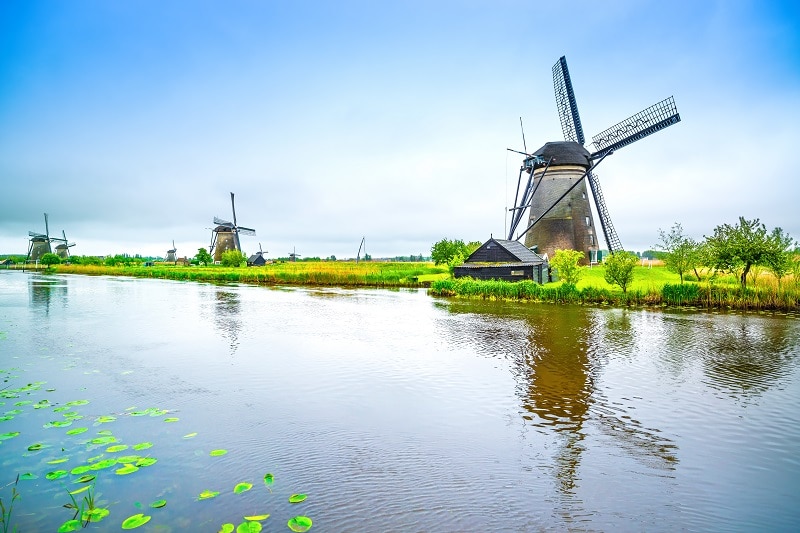 Windmills and canal in Kinderdijk, Holland or Netherlands. Unesco site