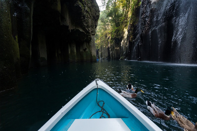 Tourist boat travel in Takachiho gorge