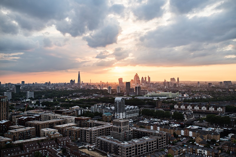 A sunset over a skyline of London.