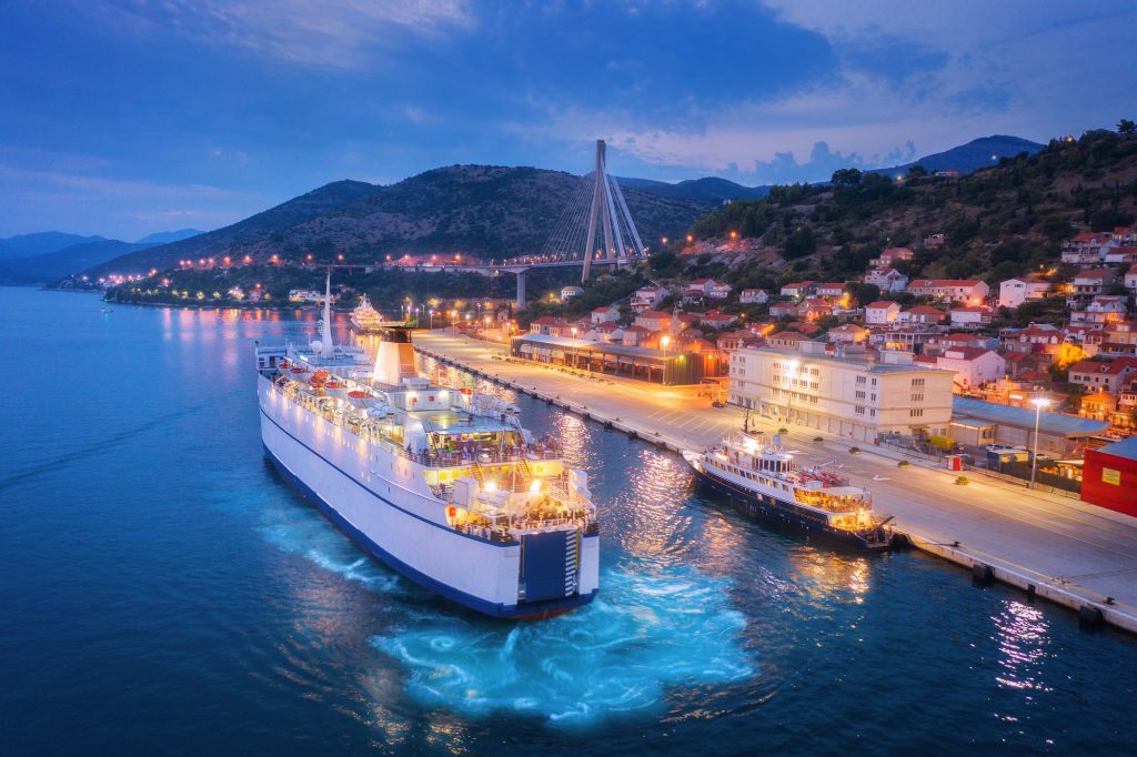 Aerial view of cruise ship at harbor at night