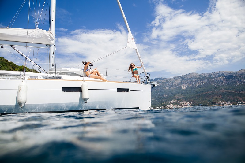 girls yachting and photograph sea cruise vacation