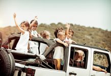 Happy kids enjoying road trip