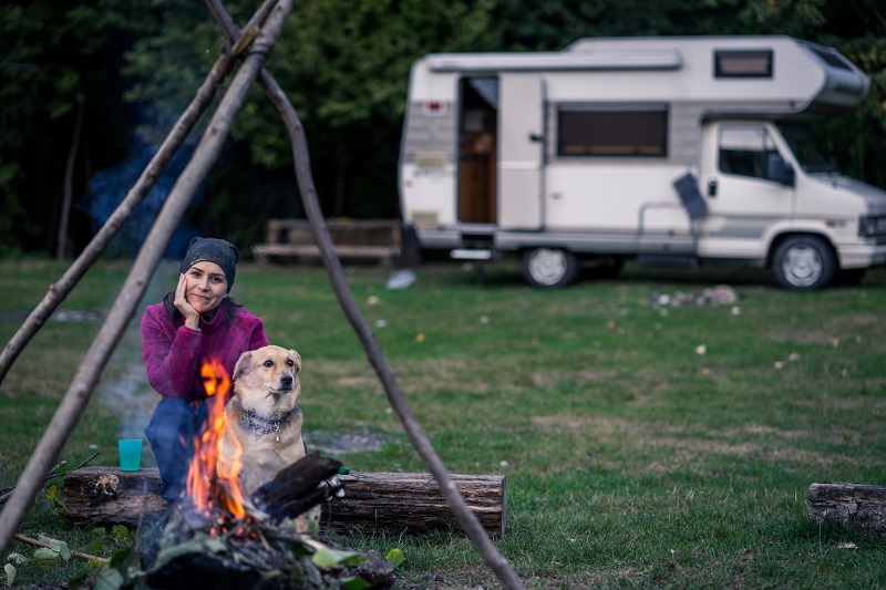 Woman and Dog Camping