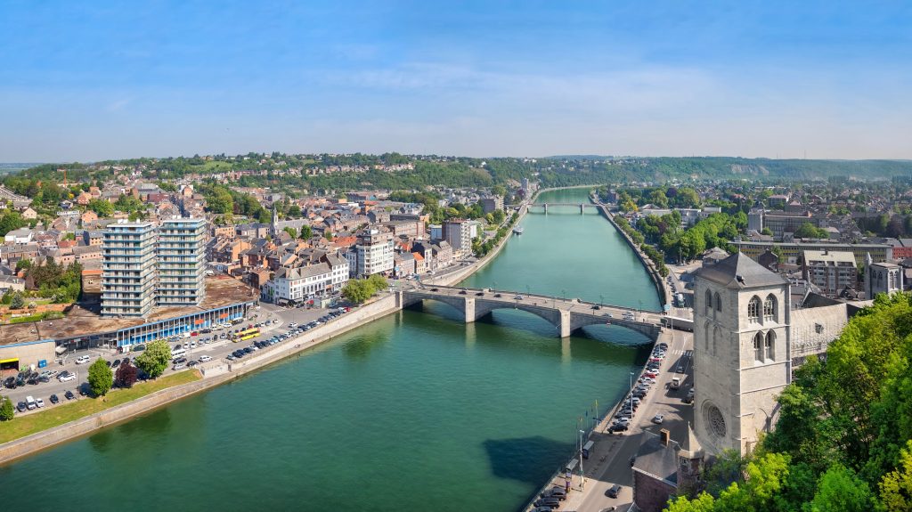 Huy, Wallonia, Belgium. Aerial cityscape with Meuse river