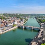 Huy, Wallonia, Belgium. Aerial cityscape with Meuse river