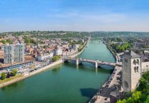 Huy, Wallonia, Belgium. Aerial cityscape with Meuse river
