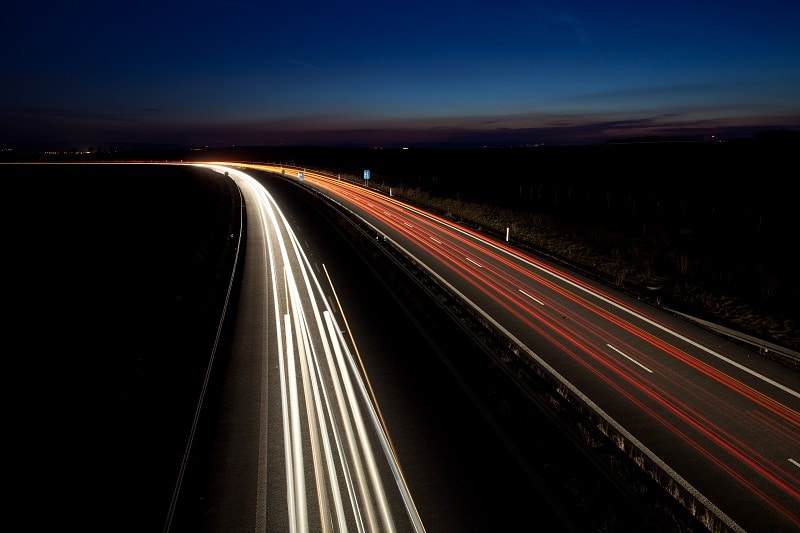 Cars moving fast on a highway