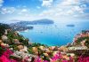 Lanscape,Of,Riviera,Coast,,Turquiose,Water,,Flowers,And,Blue,Sky