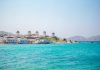 Famous view of traditional greek windmills on Mykonos island at sunrise, Cyclades, Greece