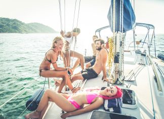 Friends on sailing boat